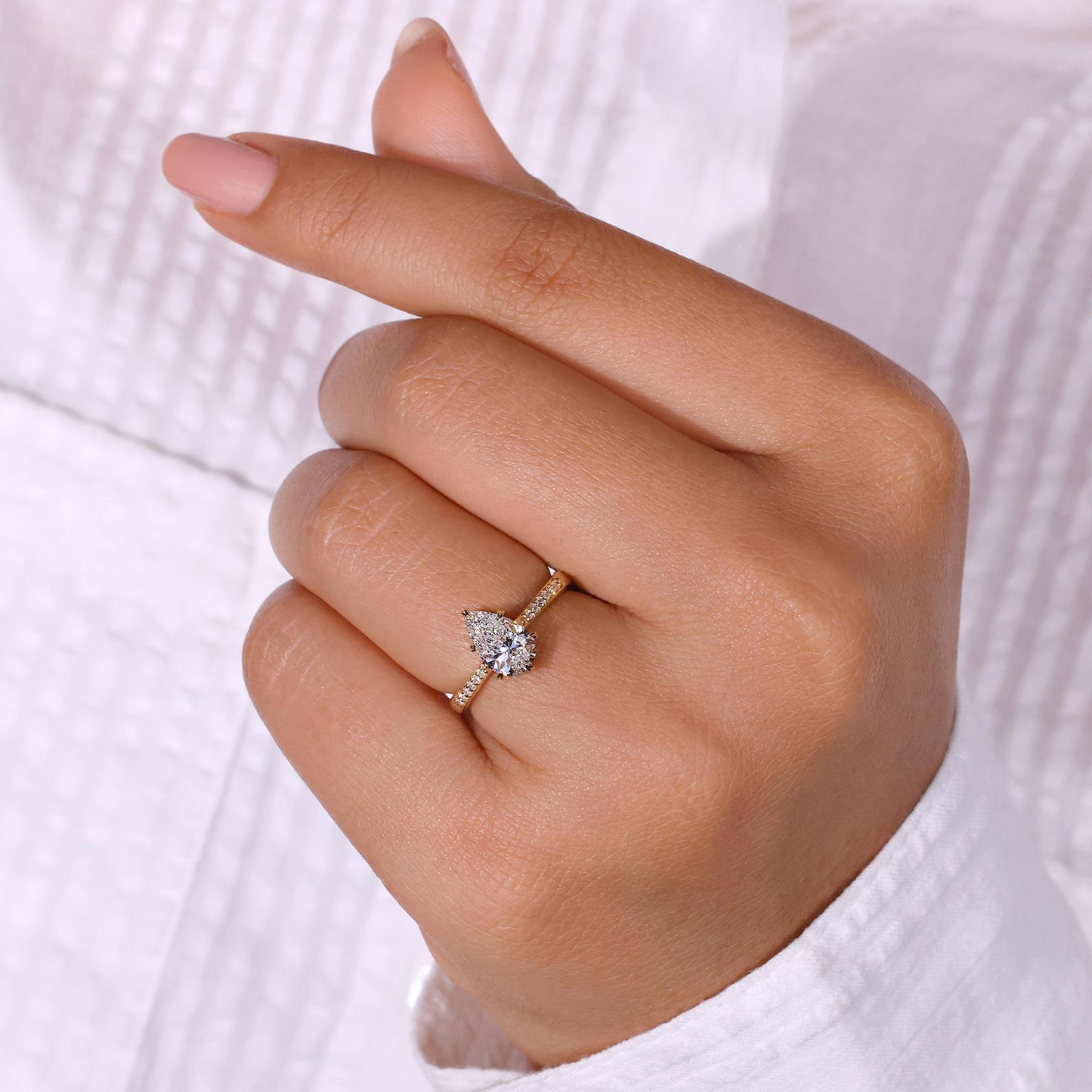 Sparkling Pear Cut Engagement Ring