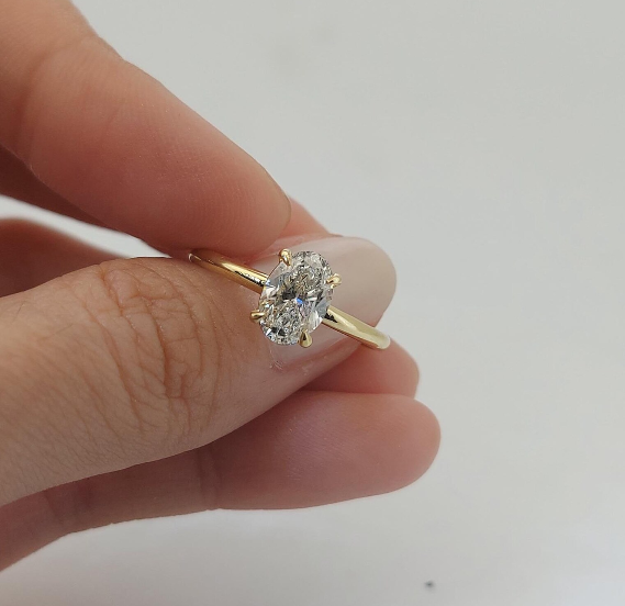 Elegant Oval Cut Solitaire Engagement Ring