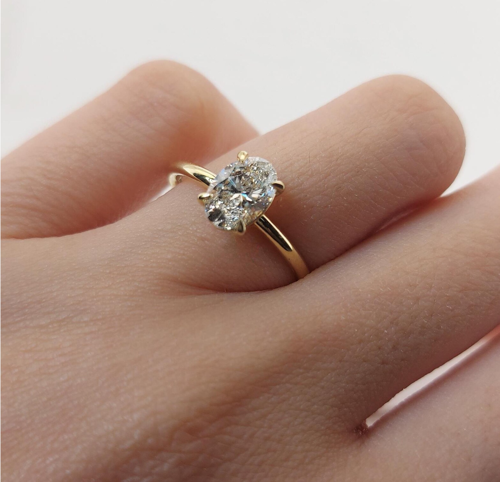 Elegant Oval Cut Solitaire Engagement Ring